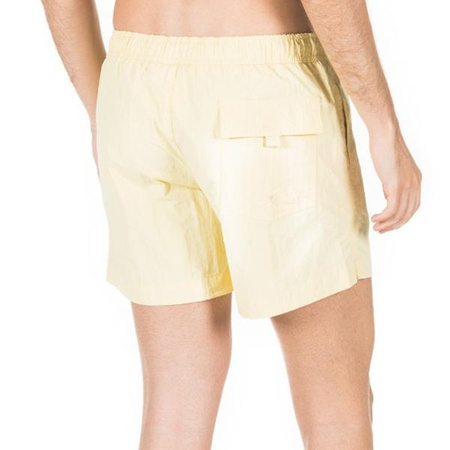 Męskie spodenki Champion Legacy BEACHSHORT w kolorze żółtym (216069YS105)