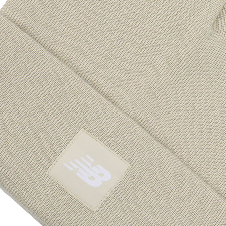 Czapka New Balance CUFFED BEANIE FLYING NB LOGO Beżowy (LAH13034TWF)