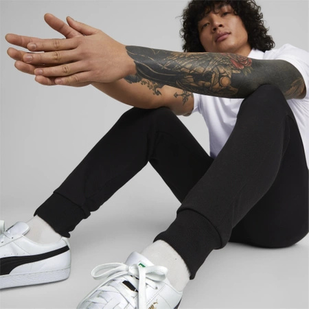 Wyprzedaż - Spodnie dresowe męskie Puma ESS LOGO PANTS TR dopasowany fason do codziennego użytku czarne (586716-01)